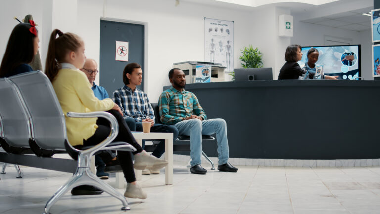 Patients waiting in a New Mexico medical practice supported by healthcare consulting services